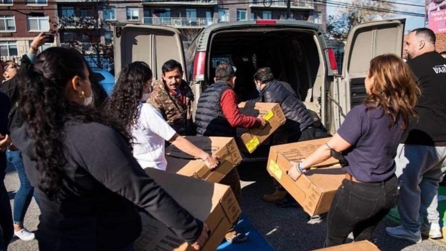 A number of local non-profits and community groups came together Thursday to distribute Thanksgiving turkeys to hundreds of families in need across the borough. (Photo provided by Queens Together)