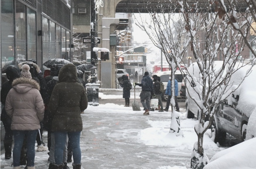 Residents braved the cold weather to line up for COVID-19 tests near Queensboro Plaza (Photo by Michael Dorgan, Queens Post)