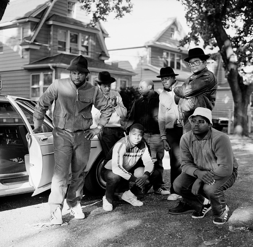 Jason "Jam Master Jay" Mizell rocks a Kangol hat at the far left in this 1984 photo that British artist Janette Beckman took near his childhood home on 205th Street in Hollis. Joseph "DJ Run" Simmons is to the immediate right, while Darryl "D.M.C." McDaniels is at the far right among those standing. They formed Run-D.M.C., a pioneering rap trio whose three-decade career included induction in the Rock and Roll Hall of Fame and a Lifetime Achievement Grammy. 