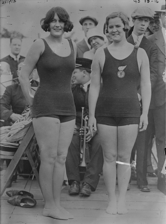 Gertrude Ederle (right) poses in a two-piece bathing suit that her sister had designed for her in this photo. The Flushing resident was 19 when she became the first woman to swim the English Channel on Aug. 6, 1926. Her memory lives on via Ederle Terrace, a public space in Flushing Meadows Corona Park. (Courtesy of Library of Congress)