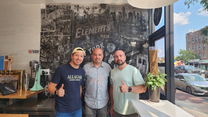 Juan Tamayo, David Velas, and Sami Velas at Elements Pizzeria. 