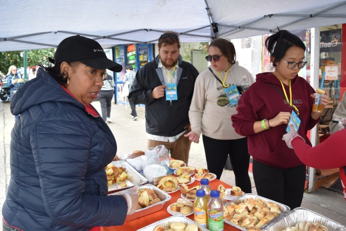 Participants sample local cuisine at the 2023 Taste of Sunnyside. Photo: Sunnyside Shines