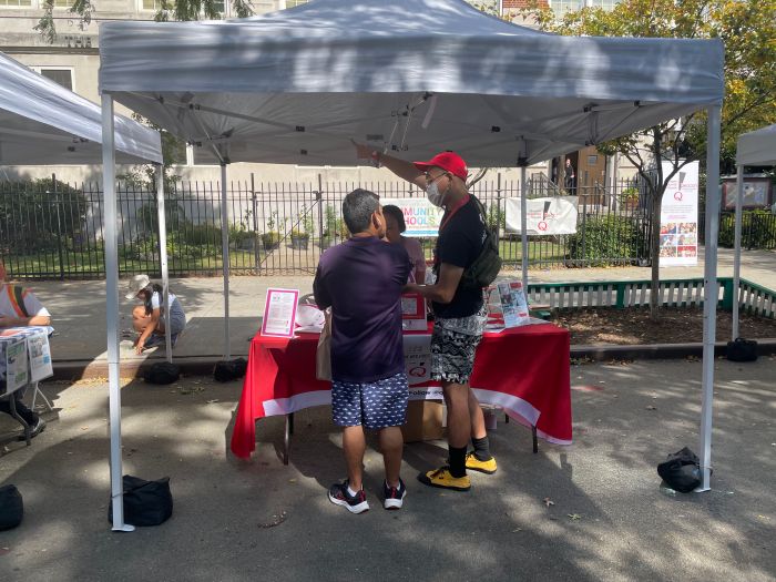 Members of the immigrant community talk to organizations during the New York Immigration Coalition's Key to the City event. 