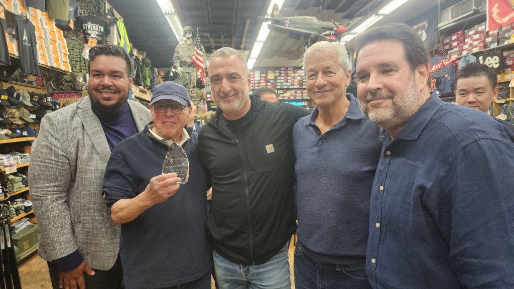 From left to right: Chase Jackson Heights branch manager X, Brown's co-owner Stuart Brown, Brown's manager Tony Minucci, JPMorgan Chase CEO Jamie Dimon and Brown's co-owner Warren Reiman. Photo: Shane O'Brien