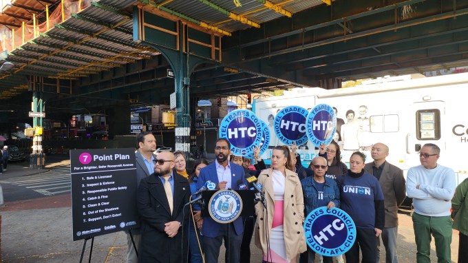 Assembly Members Steve Raga and Catalina Cruz and Council Member Shekar Krishnan unveil a seven-point plan to make Roosevelt Avenue safer. Photo: Shane O'Brien