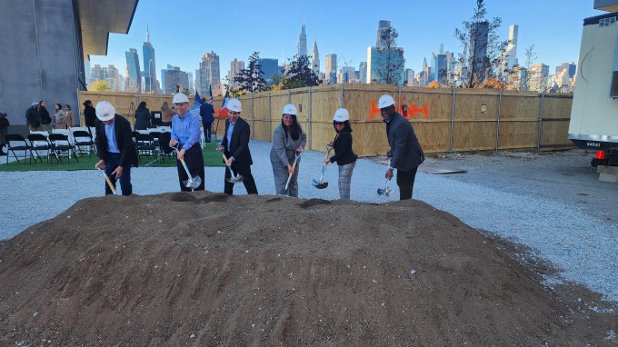 SCA President and CEO Nina Kubota (center, grey jacket) and representatives from Navillus Tile and Purcell Everett Architects during Monday's ground-breaking ceremony. Photo: Shane O'Brien