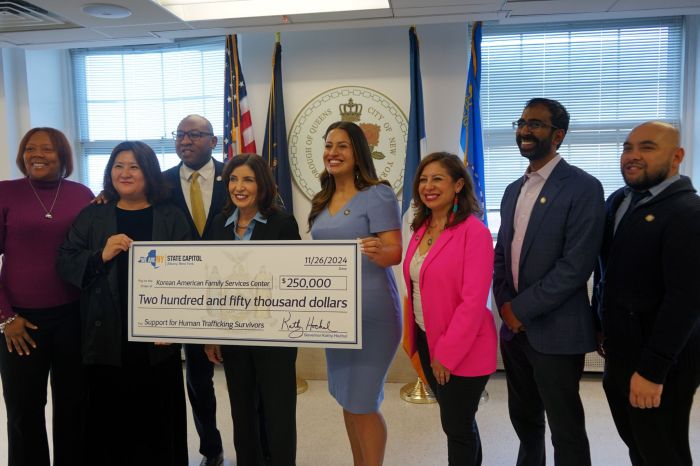 From left to right: AM-elect Larinda Hooks, Korean American Family Service Center executive director Jeehae Fischer, Queens Borough President Donovan Richards, Gov. Kathy Hochul, AM Catalina Cruz, AM Jessica González-Rojas, CM Shekar Krishnan and AM Steven Raga at the launch of the Roosevelt Avenue fund Tuesday. Photo: Office of Jessica González-Rojas