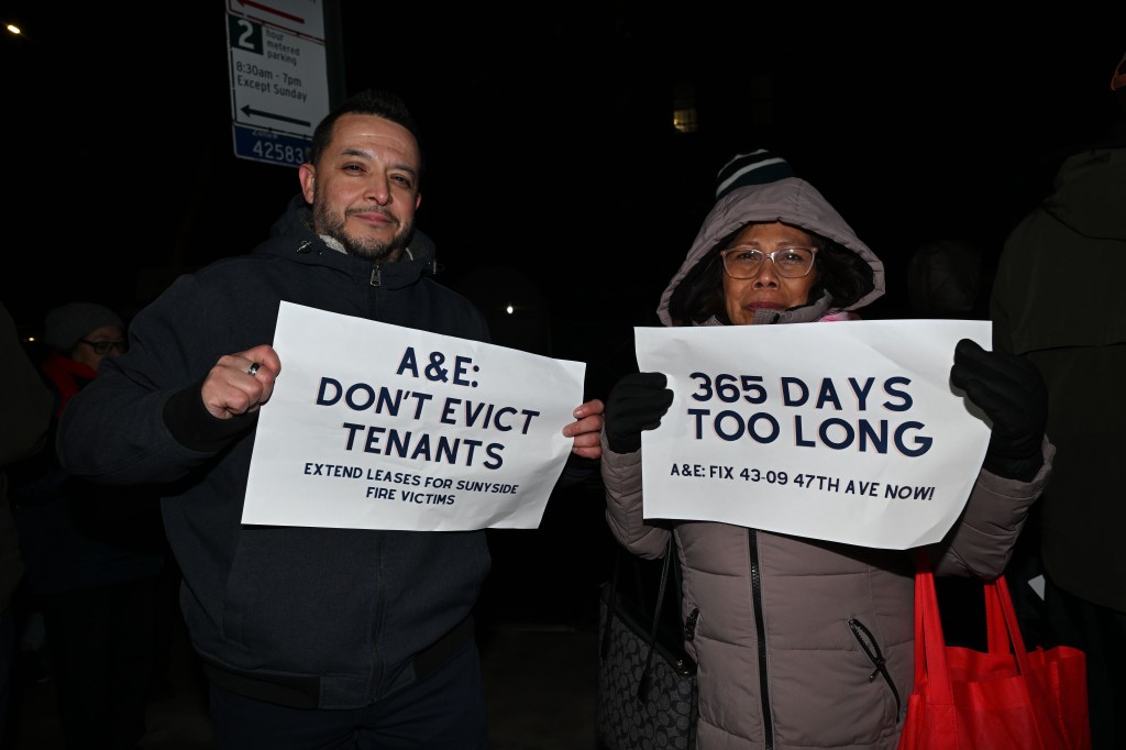 Residents gather at 43-09 47th Ave. to commemorate one-year anniversary of five-alarm fire. Photo: Ramy Mahmoud.