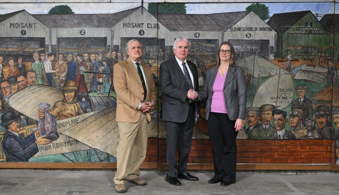 Cradle of Aviation Museum Curator Joshua Stoff, Museum President Andrew Parton and Vaughn College Assistant Vice President Maureen Kiggins at Tuesday's ceremony. Photo: Ramy Mahmoud. 