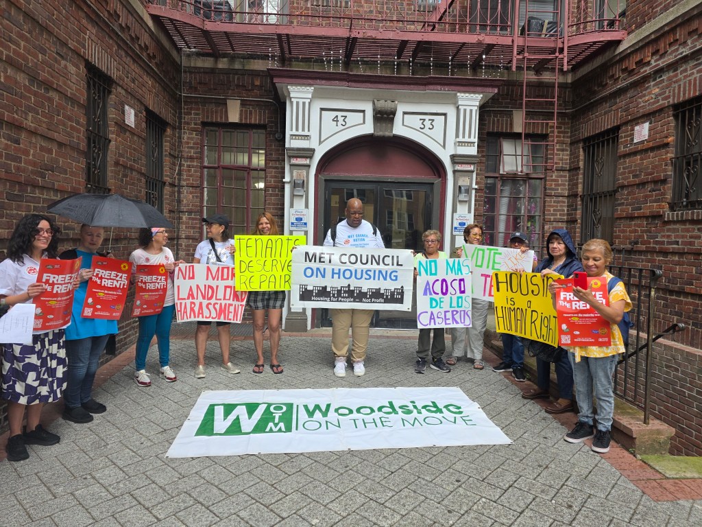 Assembly Member Claire Valdez, Woodside on the Move, the Met Council on Housing and Sunnyside residents protest against alleged tenant harassment at 43-33 48th St. Photo: Shane O'Brien.