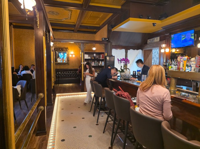 Dim Sum Palace has retained the historic mahogany bar of Brooks 1890. Photo: Shane O'Brien.