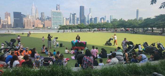 Families enjoy a puppet show from Wonderspark Puppets at last year's Summer Kids. Photo courtesy of HPPC.